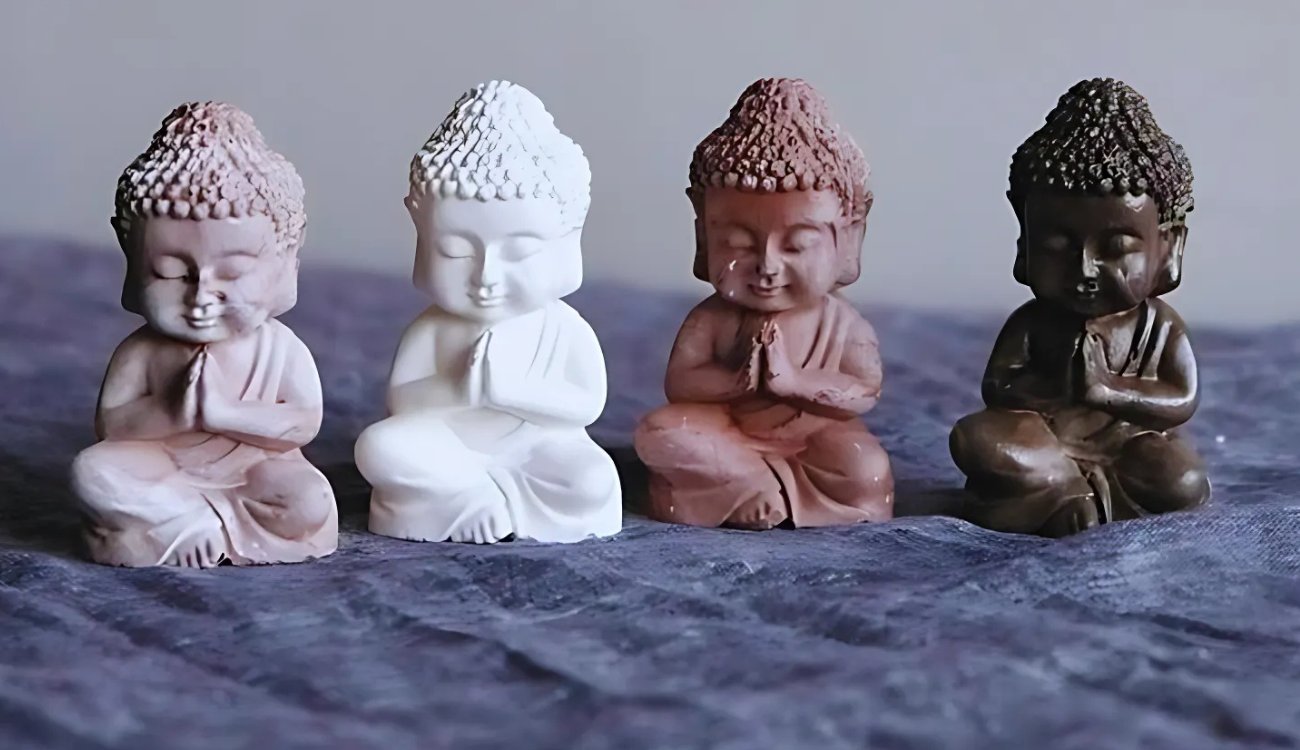 Detailed gypsum Buddha statue, symbolizing peace and mindfulness, perfect for enriching a meditation room's ambiance.